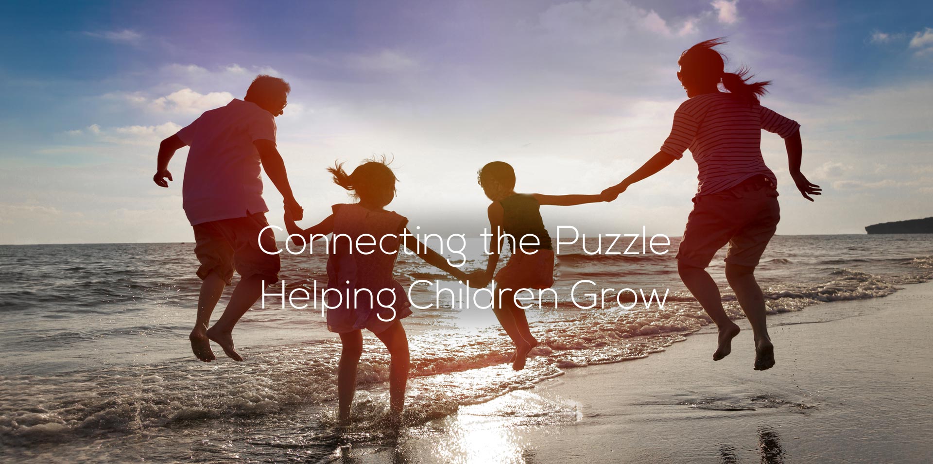 Family on the beach celebrating after online parenting class in Livonia Michigan