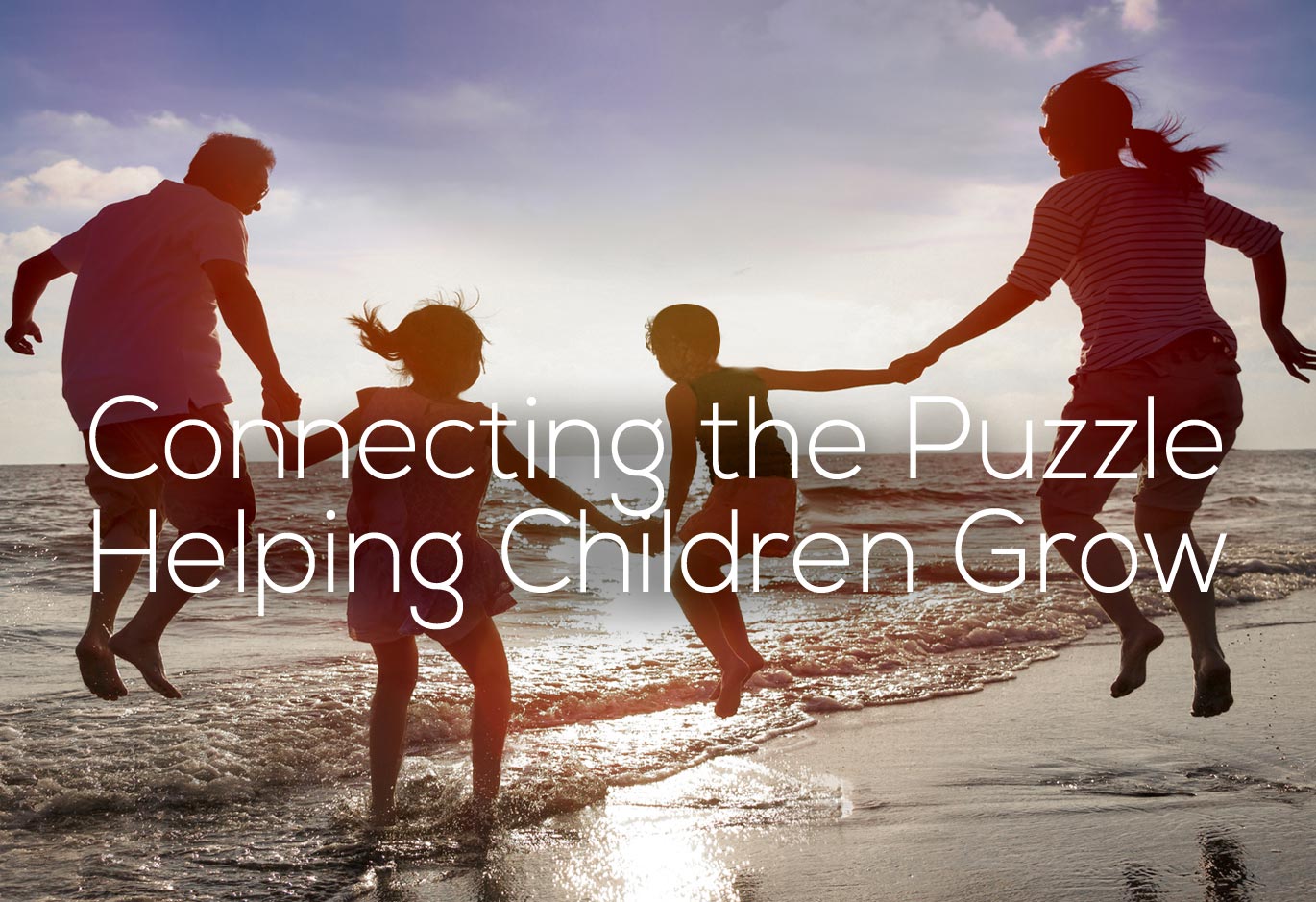 Family on the beach celebrating after online parenting class in Livonia Michigan